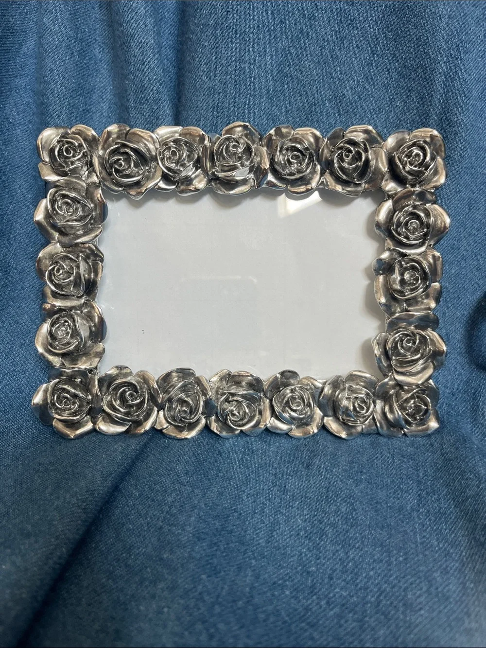 Rose adorned 6 1/2 x 4 1/2 metal frame